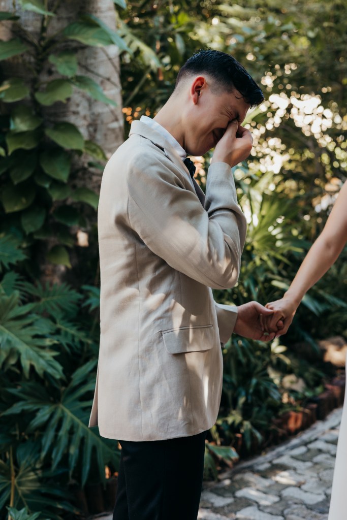 groom crying during first look in mexico wedding