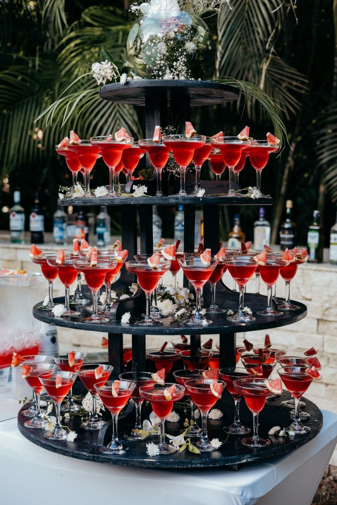 cocktail hour detail shot fun drink tower in mexico