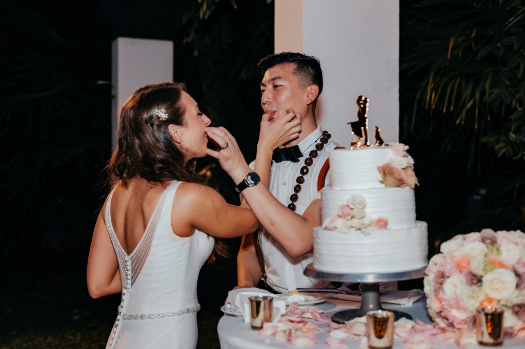 cake cutting at destination wedding in Mexico