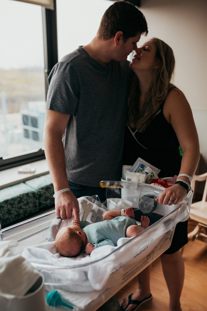Parents with new baby in the hospital
