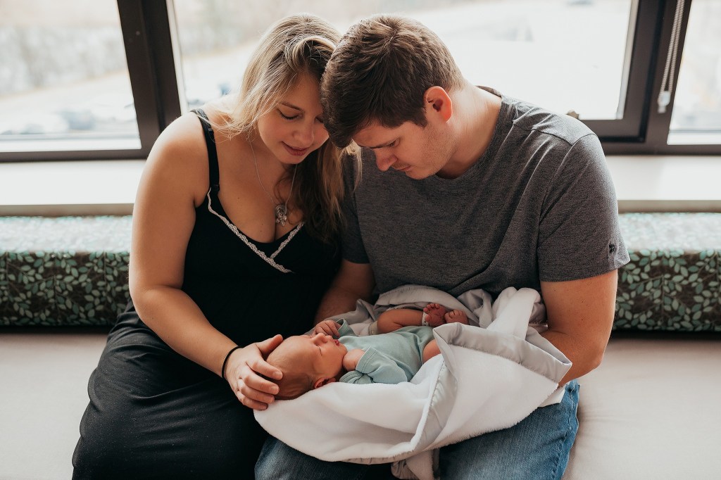 Professional family photo with newborn in the hospital